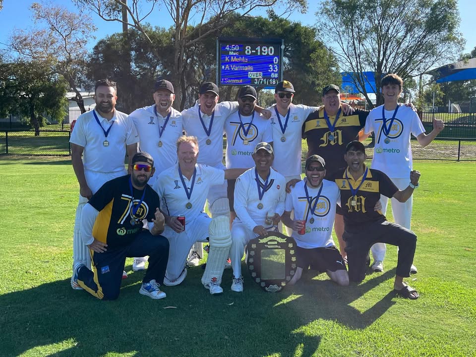 Mackie Cricket Club team celebrating a premiership victory.